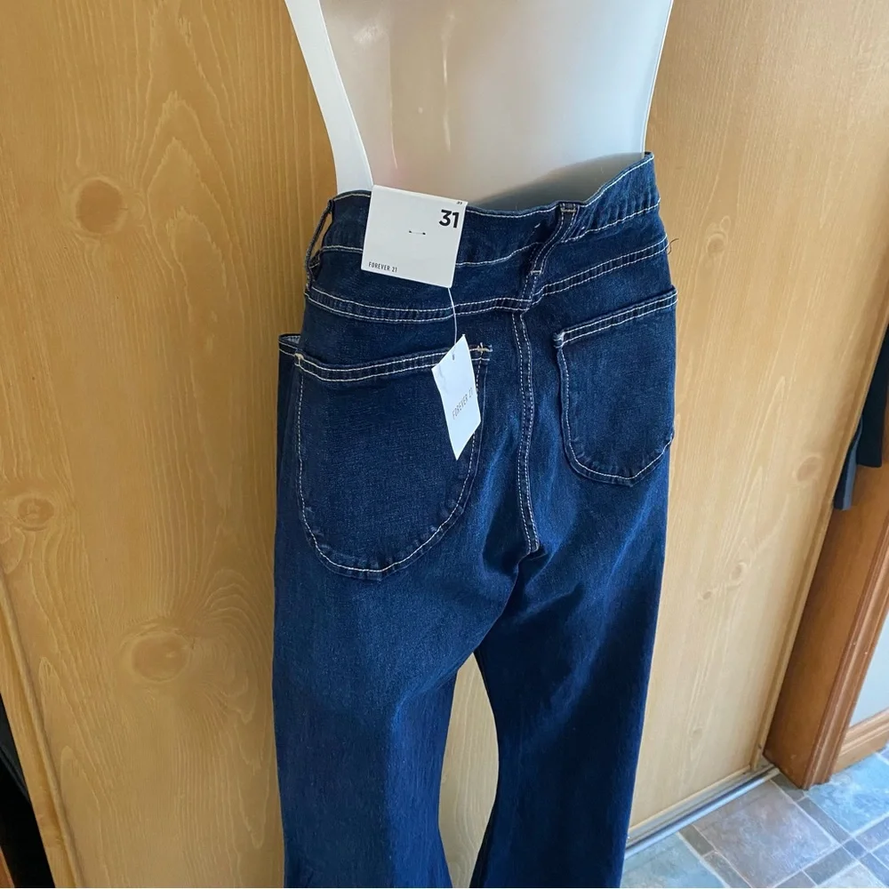 Forever 21 • Low-Rise Dark Wash Raw Hem Flare Jeans - Picture 12 of 16